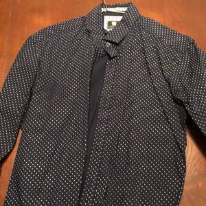 Navy blue button down with white polka dots.